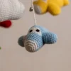Crochet airplane cot hanging showing full mobile width with multiple colourful aircraft handmade nursery decor Australia