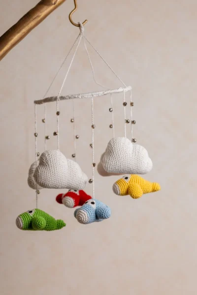 Crochet airplane cot hanging showing full mobile width with multiple colourful aircraft handmade nursery decor Australia