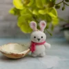 Handmade crochet bunny keyring with floppy ears and stitched face made by artisan crafters Australia