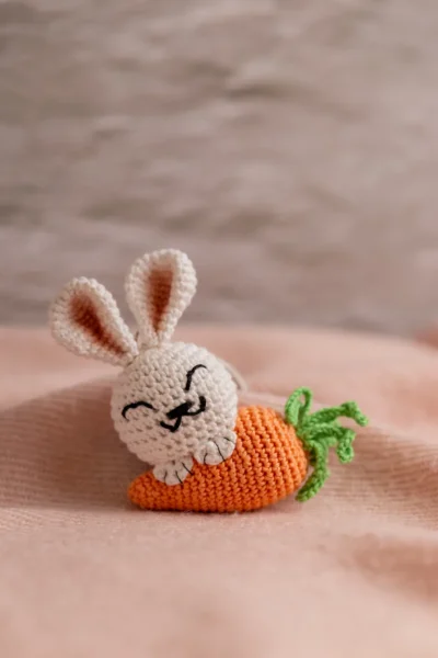 Handmade crochet white bunny holding orange carrot keyring made by artisan crafters Australia