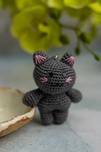 Miniature crochet doll keyring clipped to bag handmade by artisan crafters unique gift for women Australia