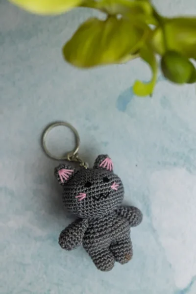 Miniature crochet doll keyring clipped to bag handmade by artisan crafters unique gift for women Australia