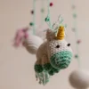 Pink and green unicorn crochet nursery mobile shown in nursery handmade baby shower gift unique colour Melbourne Australia