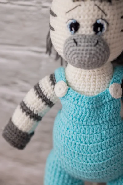 Handmade crochet amigurumi zebra toy with black and white stripe pattern made by artisan crafters soft toy gift Australia