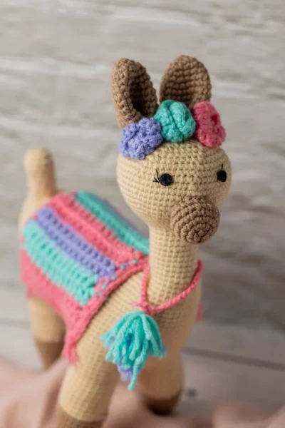 Handmade crochet amigurumi llama toy with chunky fluffy texture friendly face and soft yarn body ethical kids gift Australia