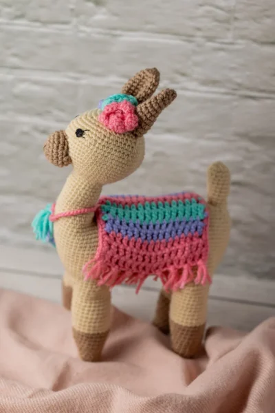 Handmade crochet amigurumi llama toy with chunky fluffy texture friendly face and soft yarn body ethical kids gift Australia