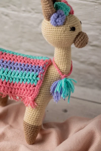 Handmade crochet amigurumi llama toy with chunky fluffy texture friendly face and soft yarn body ethical kids gift Australia