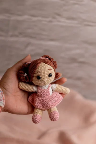 Handmade crochet miniature amigurumi doll small soft toy with detailed yarn features made by artisan crafters gift Australia