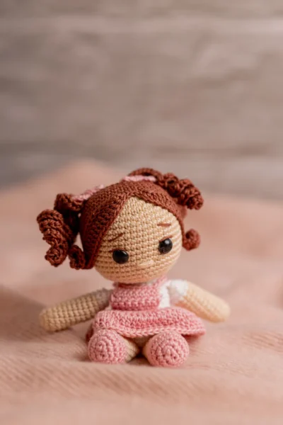 Handmade crochet miniature amigurumi doll small soft toy with detailed yarn features made by artisan crafters gift Australia