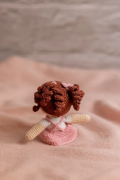 Handmade crochet miniature amigurumi doll small soft toy with detailed yarn features made by artisan crafters gift Australia