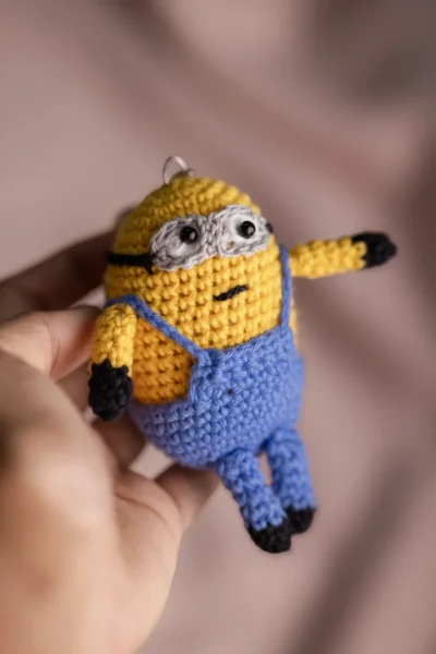 Yellow crochet two eyed character keychain showing goggle detail handmade fun bag charm Australia