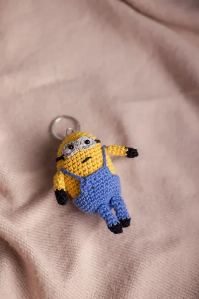 Yellow crochet two eyed character keychain showing goggle detail handmade fun bag charm Australia