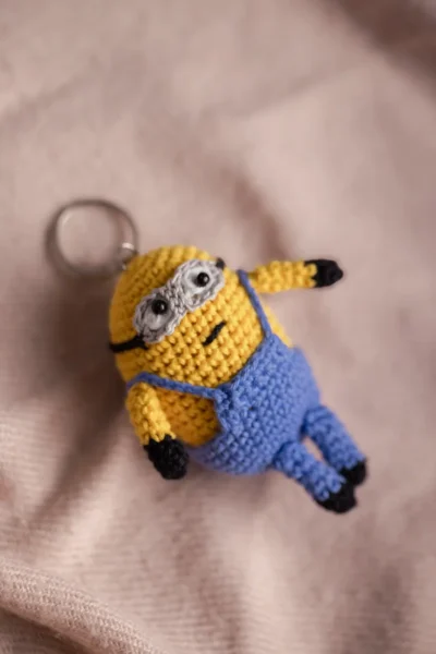 Yellow crochet two eyed character keychain showing goggle detail handmade fun bag charm Australia