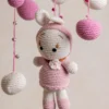 Handmade crochet pink bunny nursery mobile with soft white and pink rabbit made by artisan women in India Australia