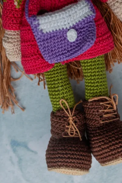 Full body view of Pollie crochet doll showing striped dress detail long soft yarn hair and amigurumi proportions Melbourne