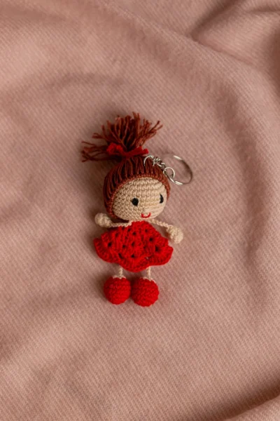 Handmade crochet little red dress charm keyring made by artisan crafters ethical gift Australia