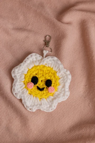 Handmade crochet white flower keyring with soft petals made by artisan crafters Australia