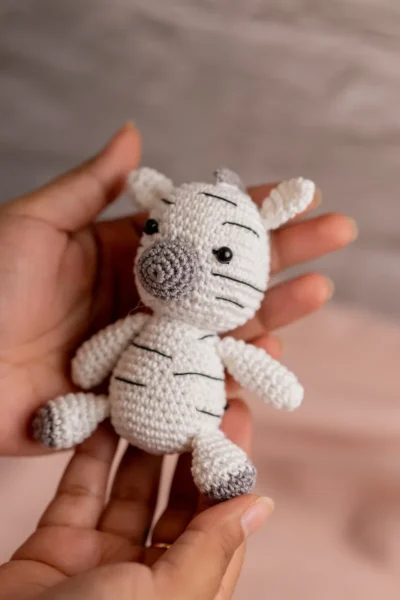 Handmade crochet zebra rattle and toy set with soft zebra companion and matching sensory rattle made by artisan crafters newborn gift Australia