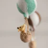 Handmade crochet zoo animal nursery mobile featuring colourful crochet animals made by artisan women in India Australia