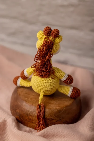 Handmade crochet amigurumi giraffe soft toy in natural colours made by artisan crafters safe for newborns and toddlers Australia