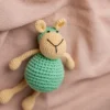 Full body view of crochet sheep soft toy Aster showing round amigurumi body neat limbs and textured woolly coat Melbourne