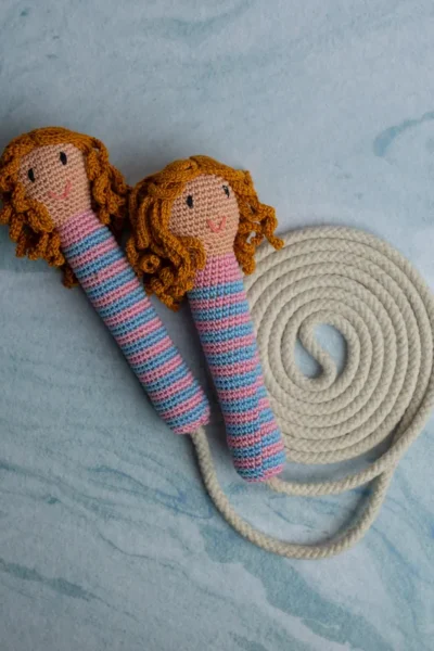 Cute doll skipping rope showing full length rope with crochet doll handles at each end handmade active play toy Melbourne
