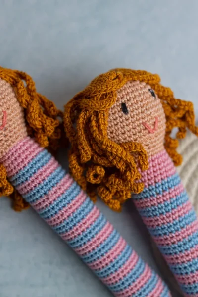 Cute doll skipping rope showing full length rope with crochet doll handles at each end handmade active play toy Melbourne