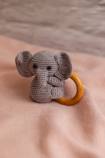 Handmade crochet elephant rattle and toy set with soft elephant companion and matching rattle made by artisan crafters newborn gift Australia