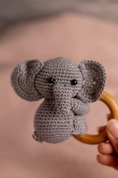 Crochet elephant rattle and toy set in nursery context soft ethical handmade baby gift shipped from Melbourne Australia