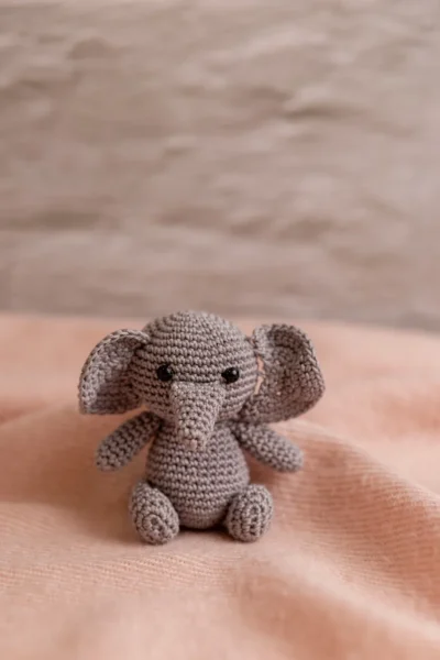 Crochet elephant rattle and toy set in nursery context soft ethical handmade baby gift shipped from Melbourne Australia