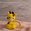Handmade crochet giraffe rattle and toy set with soft giraffe companion and matching rattle made by artisan women in India newborn gift Australia