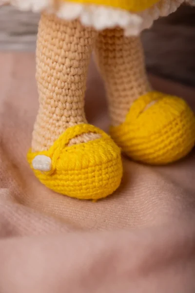 Handmade amigurumi doll in yellow floral dress styled on shelf keepsake soft toy gift shipped from Melbourne Australia