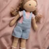 Handmade crochet Ruby the adventure doll in blue overalls with soft yarn body and stitched face made by artisan crafters gift Australia