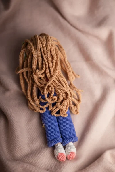 Handmade crochet boho daisy amigurumi doll with soft dress and wild hair made by artisan crafters keepsake gift for kids Australia