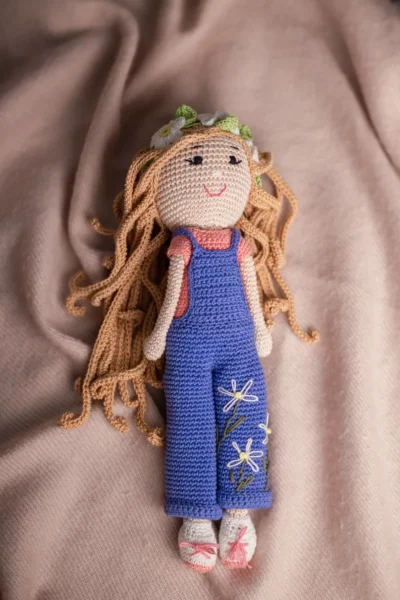 Handmade crochet boho daisy amigurumi doll with soft dress and wild hair made by artisan crafters keepsake gift for kids Australia