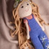 Front view of handmade crochet boho daisy doll with stitched face and soft cotton yarn details artisan made gift Australia
