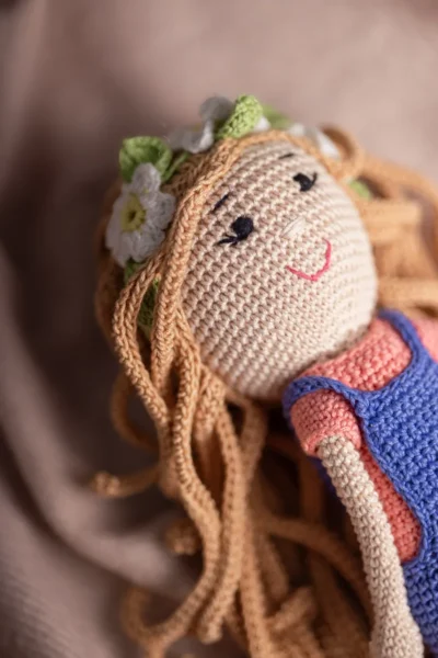 Handmade crochet boho daisy amigurumi doll with soft dress and wild hair made by artisan crafters keepsake gift for kids Australia